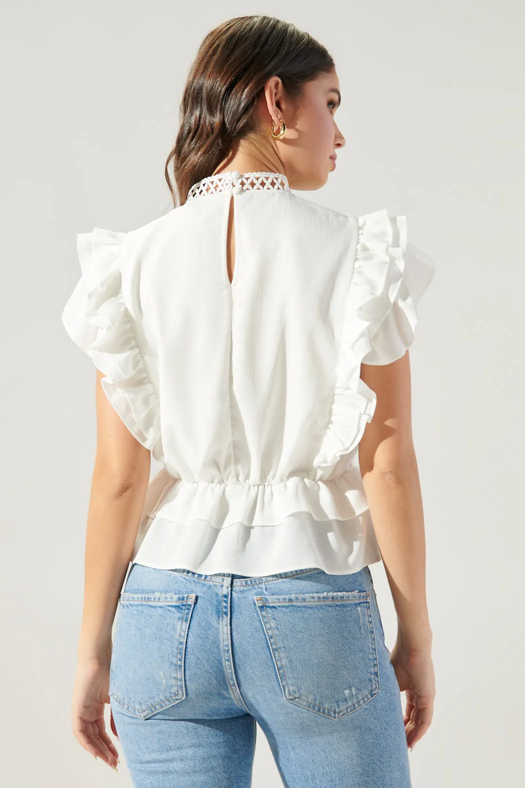 Aubrie Mock Neck Ruffle Peplum Blouse